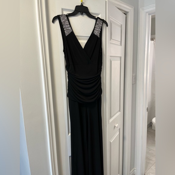 Black stretch material pants suit with shoulder embellishments - Picture 1 of 4